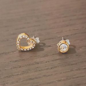 Michael Kors mismatched stud earrings